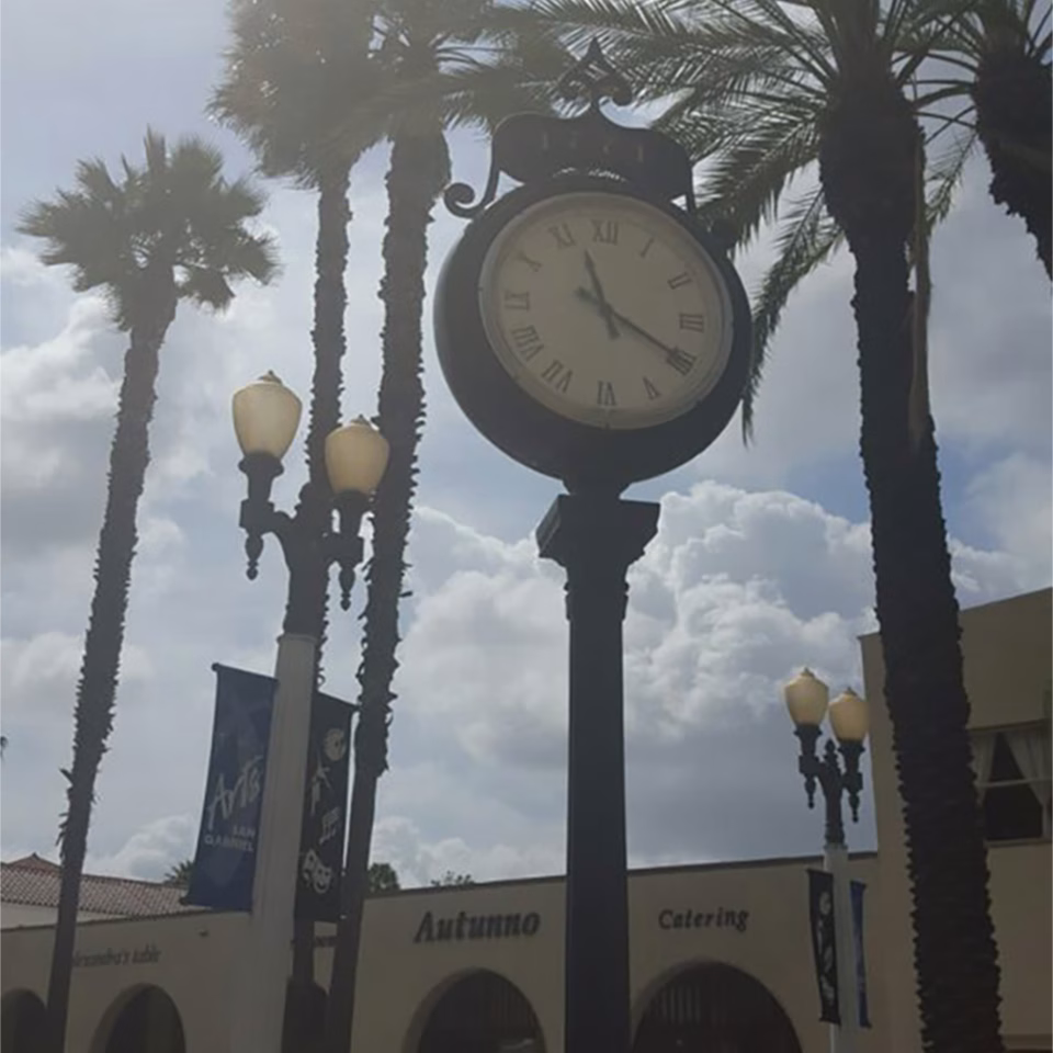 Prominent clock in front of San Gabriel mission